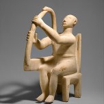 Marble Figure of a harpist from the Early Cycladic. Metropolitan Museum of Art, AN 47.100.1