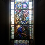 I don't know the artist,but this is a stained glass window at Auckland Art Gallery.